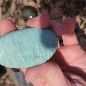 amazonite palm stone with flash